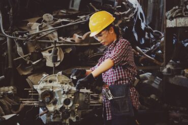 Photo by Chevanon Photography: https://www.pexels.com/photo/woman-wears-yellow-hard-hat-holding-vehicle-part-1108101/