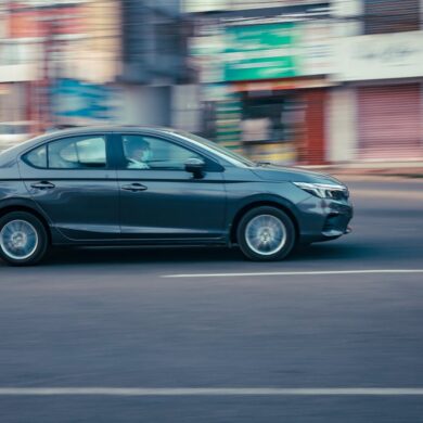 Photo by Ajin K S: https://www.pexels.com/photo/black-sedan-on-the-road-10921166/