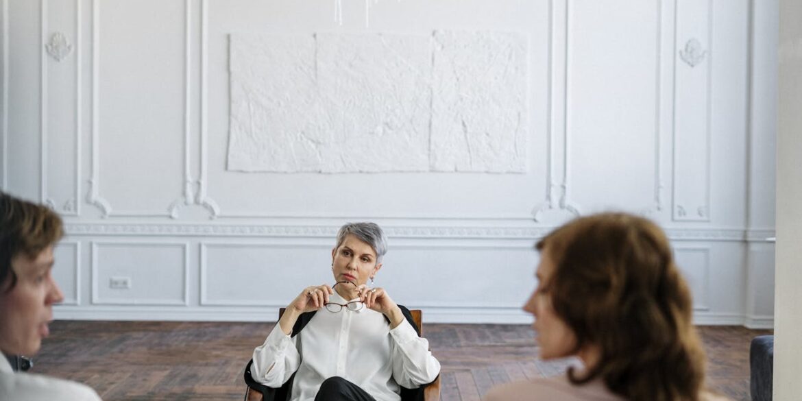Photo by cottonbro studio: https://www.pexels.com/photo/woman-in-white-long-sleeve-shirt-sitting-on-brown-couch-4098233/