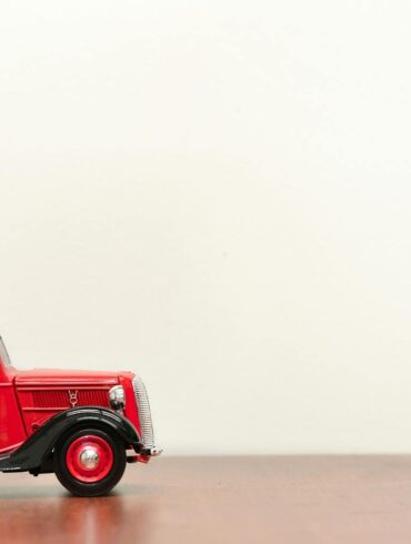 Photo by Eneida Nieves: https://www.pexels.com/photo/classic-red-vehicle-scale-model-1112597/