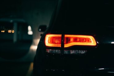 Photo by Erik Mclean: https://www.pexels.com/photo/close-up-on-car-lights-at-night-9966010/