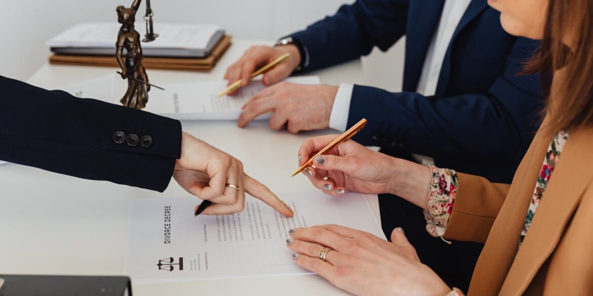 Photo by Photo By: Kaboompics.com: https://www.pexels.com/photo/woman-signing-a-decree-7876038/