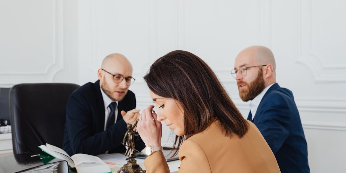Photo by Photo By: Kaboompics.com: https://www.pexels.com/photo/sad-woman-sitting-next-to-the-bearded-man-7876199/