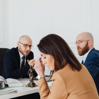 Photo by Photo By: Kaboompics.com: https://www.pexels.com/photo/sad-woman-sitting-next-to-the-bearded-man-7876199/