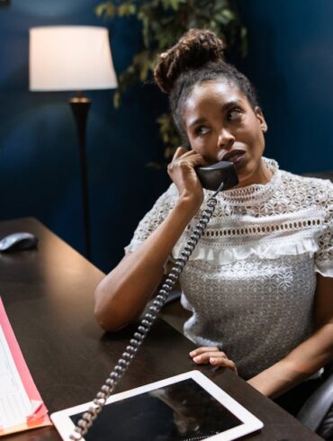 Photo by RDNE Stock project: https://www.pexels.com/photo/a-woman-in-white-shirt-sitting-on-a-chair-6170560/