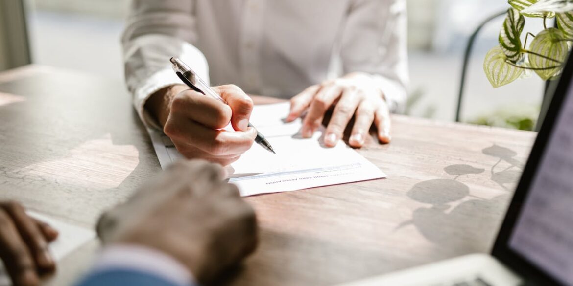 Photo by RDNE Stock project: https://www.pexels.com/photo/close-up-of-a-person-signing-a-document-7821913/