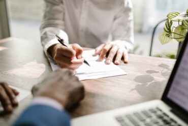 Photo by RDNE Stock project: https://www.pexels.com/photo/close-up-of-a-person-signing-a-document-7821913/