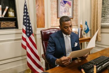 Photo by RDNE Stock project: https://www.pexels.com/photo/a-man-in-suit-while-reading-a-document-7841425/