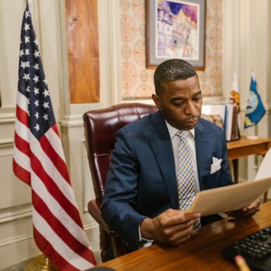 Photo by RDNE Stock project: https://www.pexels.com/photo/a-man-in-suit-while-reading-a-document-7841425/