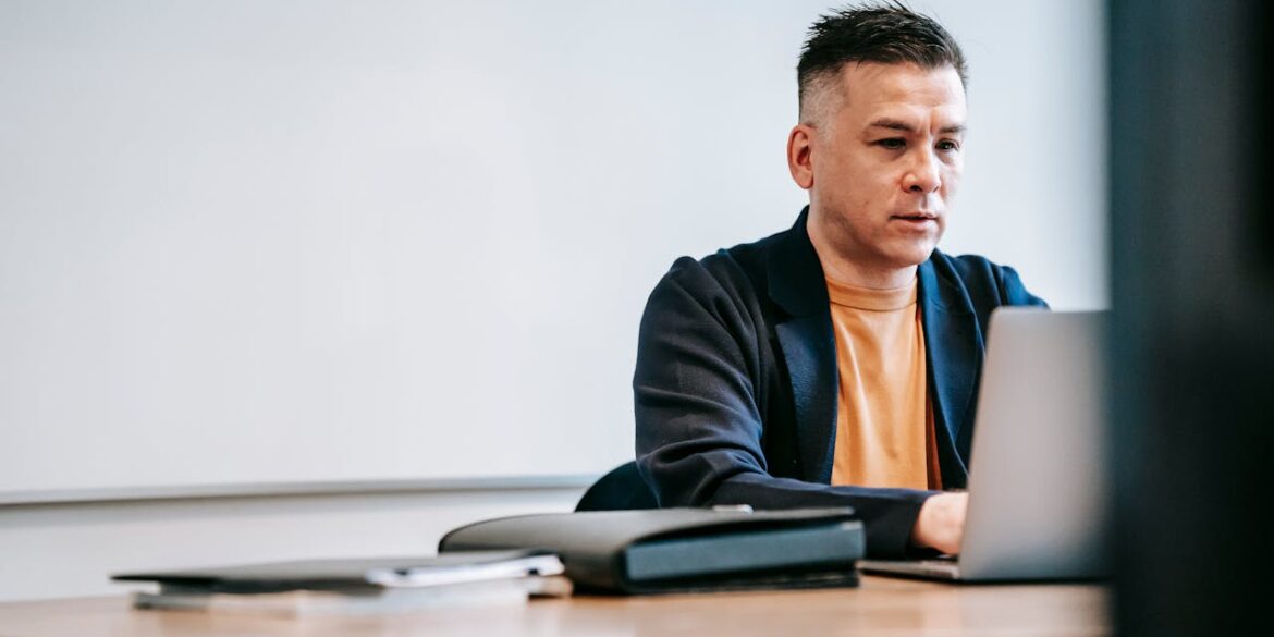 Photo by Vanessa Garcia : https://www.pexels.com/photo/photo-of-man-engaged-in-his-laptop-6325903/
