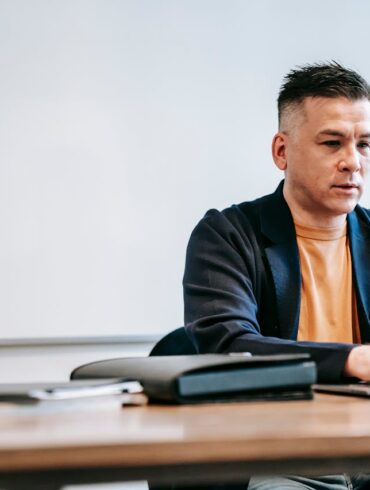 Photo by Vanessa Garcia : https://www.pexels.com/photo/photo-of-man-engaged-in-his-laptop-6325903/