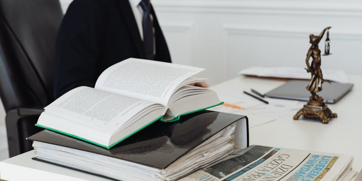 Photo by Photo By: Kaboompics.com: https://www.pexels.com/photo/book-and-binder-on-a-desk-7876088/