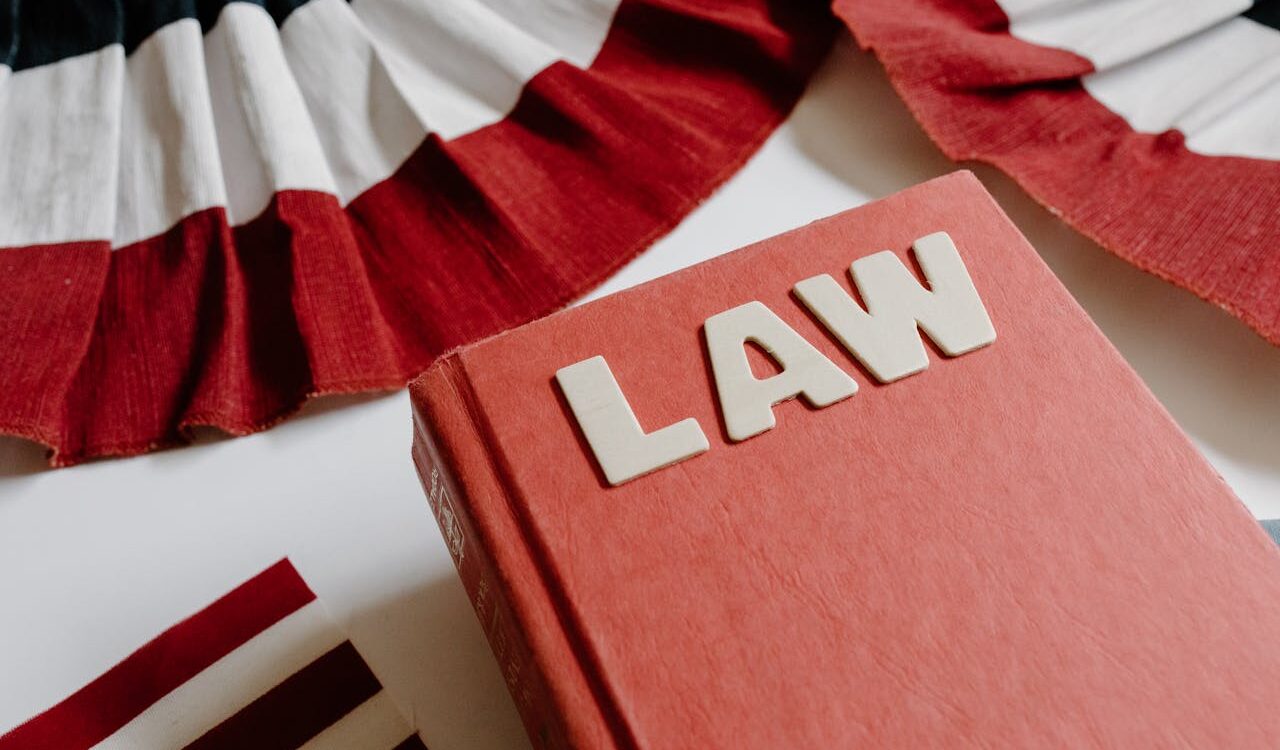 Photo by Tara Winstead: https://www.pexels.com/photo/close-up-shot-of-a-law-book-8850742/