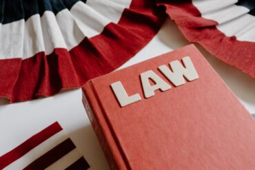 Photo by Tara Winstead: https://www.pexels.com/photo/close-up-shot-of-a-law-book-8850742/