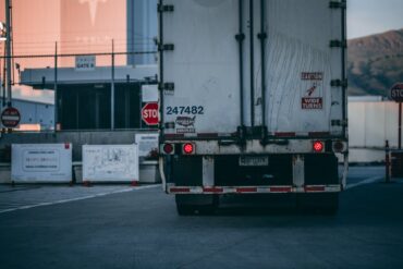 Photo by Craig Adderley: https://www.pexels.com/photo/white-freight-truck-close-up-photography-2449454/