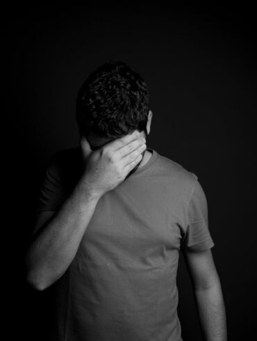 Photo by Daniel Reche: https://www.pexels.com/photo/man-hiding-his-eyes-with-hand-5202004/