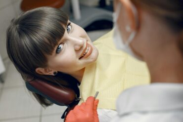 Photo by Gustavo Fring: https://www.pexels.com/photo/portrait-of-woman-in-dentist-chair-4971500/