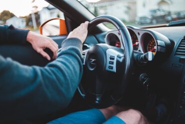 Photo by Erik Mclean: https://www.pexels.com/photo/man-driving-expensive-luxury-car-in-comfortable-interior-5158246/