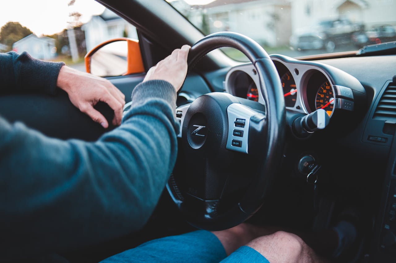Photo by Erik Mclean: https://www.pexels.com/photo/man-driving-expensive-luxury-car-in-comfortable-interior-5158246/