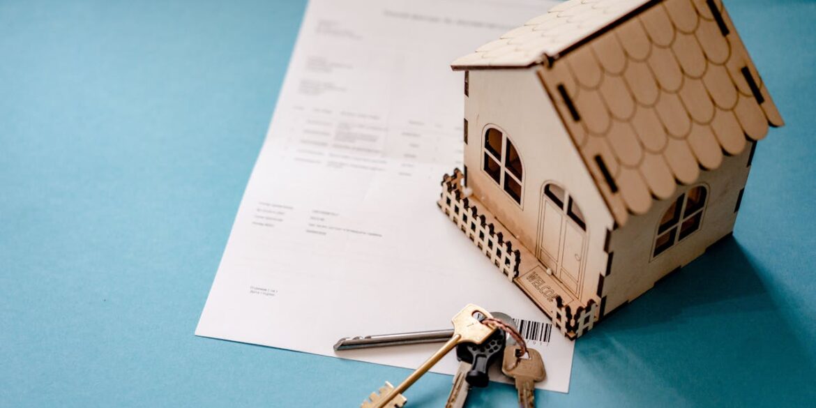 Photo by Atlantic Ambience: https://www.pexels.com/photo/wooden-house-moder-keys-and-contract-on-table-12955837/
