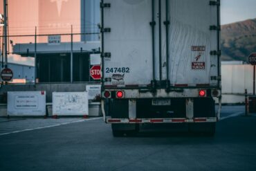 Photo by Craig Adderley: https://www.pexels.com/photo/white-freight-truck-close-up-photography-2449454/