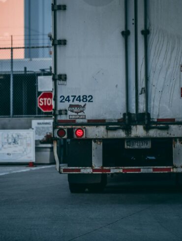 Photo by Craig Adderley: https://www.pexels.com/photo/white-freight-truck-close-up-photography-2449454/