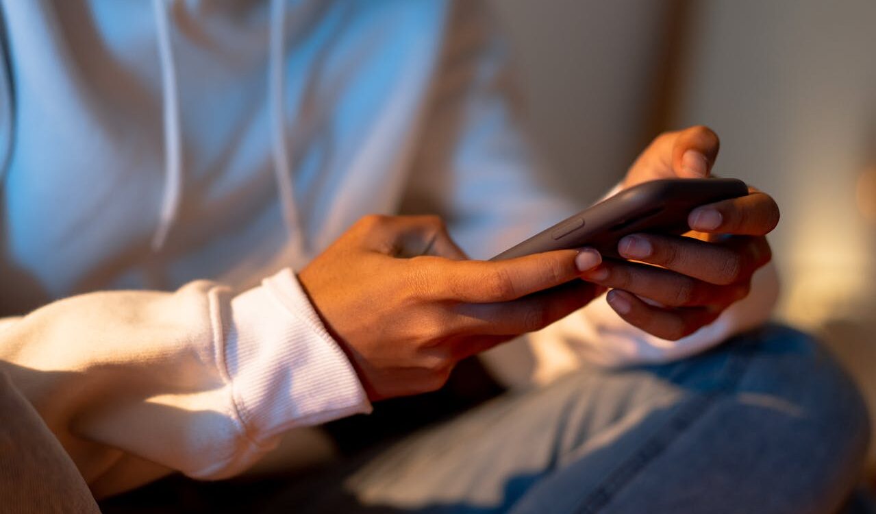Photo by cottonbro studio: https://www.pexels.com/photo/a-person-holding-a-smartphone-6698737/