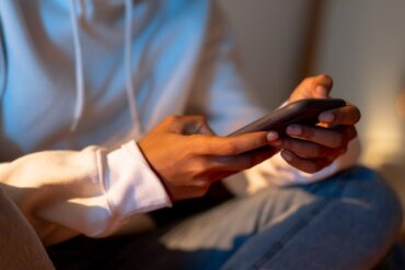 Photo by cottonbro studio: https://www.pexels.com/photo/a-person-holding-a-smartphone-6698737/