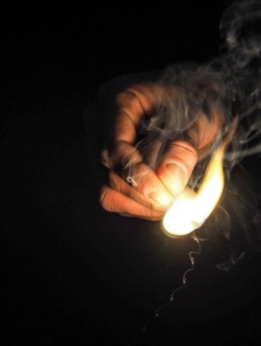 Photo by energepic.com: https://www.pexels.com/photo/person-holding-matchstick-426444/