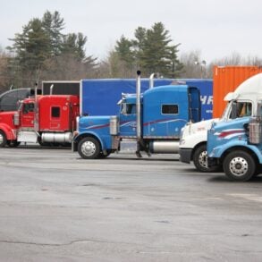 Photo by YL Lew: https://www.pexels.com/photo/colorful-semi-trucks-parked-in-open-lot-35996049/