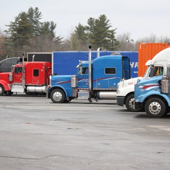 Photo by YL Lew: https://www.pexels.com/photo/colorful-semi-trucks-parked-in-open-lot-35996049/