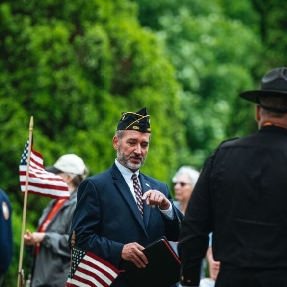 Photo by Chris F: https://www.pexels.com/photo/men-in-suit-and-uniforms-and-with-flags-in-ceremony-26225440/