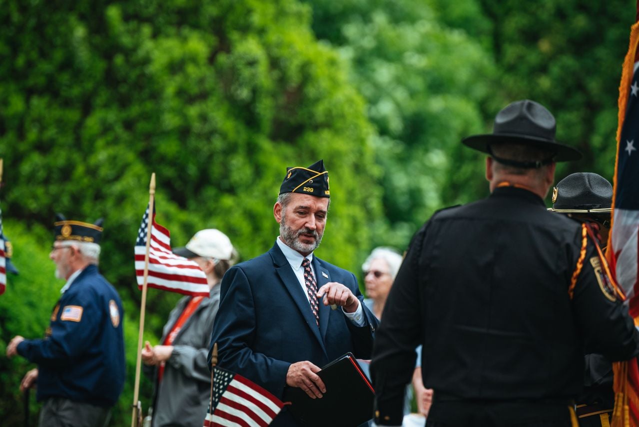 Photo by Chris F: https://www.pexels.com/photo/men-in-suit-and-uniforms-and-with-flags-in-ceremony-26225440/