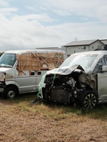 Photo by Huu Huynh: https://www.pexels.com/photo/two-damaged-vans-in-a-residential-area-28443036/