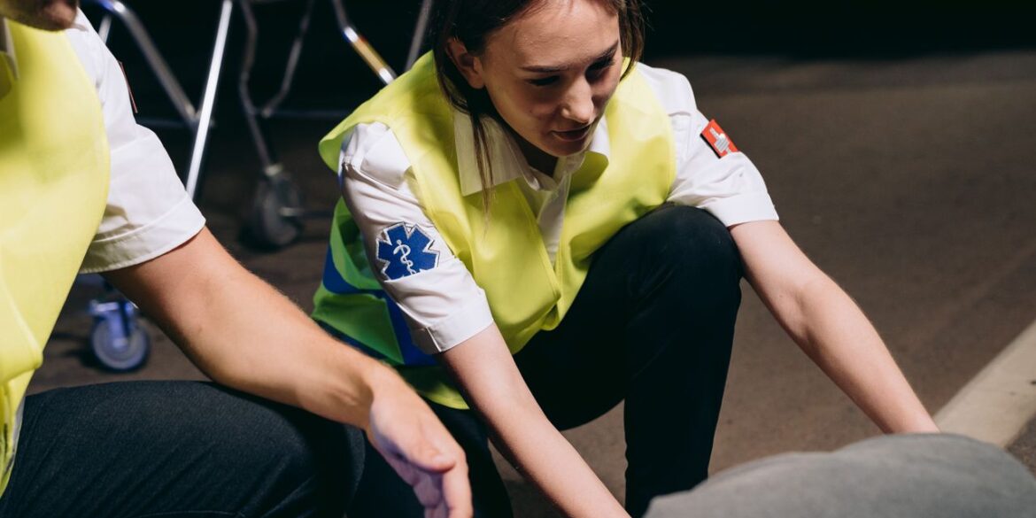 Photo by Mikhail Nilov: https://www.pexels.com/photo/paramedics-helping-the-casualty-lying-on-the-ground-8942736/